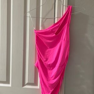 One shoulder, hot pink body suit